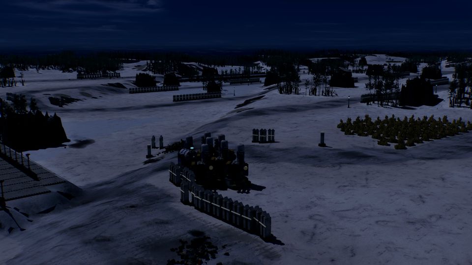 A fortified snowfield at night under a deep blue sky.